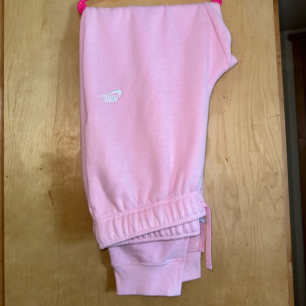 women’s baby pink Nike joggers